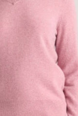Close-up of a pink cashmere fabric texture