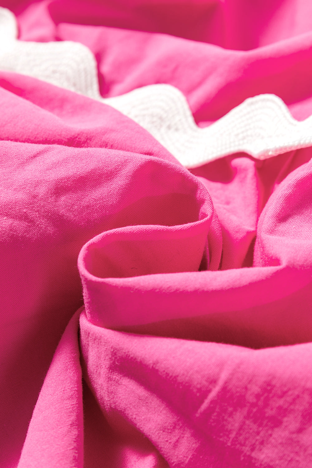 Close-up of pink fabric with a soft texture. Women's dresses, midi dress, cotton dress, summer dress, 100% cotton dress.