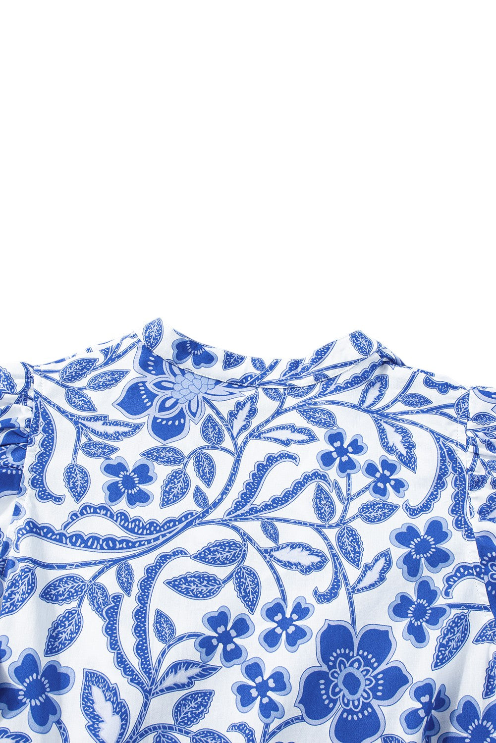 Close-up of a blue floral pattern on a white background. Women's dress, summer dress, cotton dress, mini dress, cotton mini dress, 100% cotton dress, summer mini dress