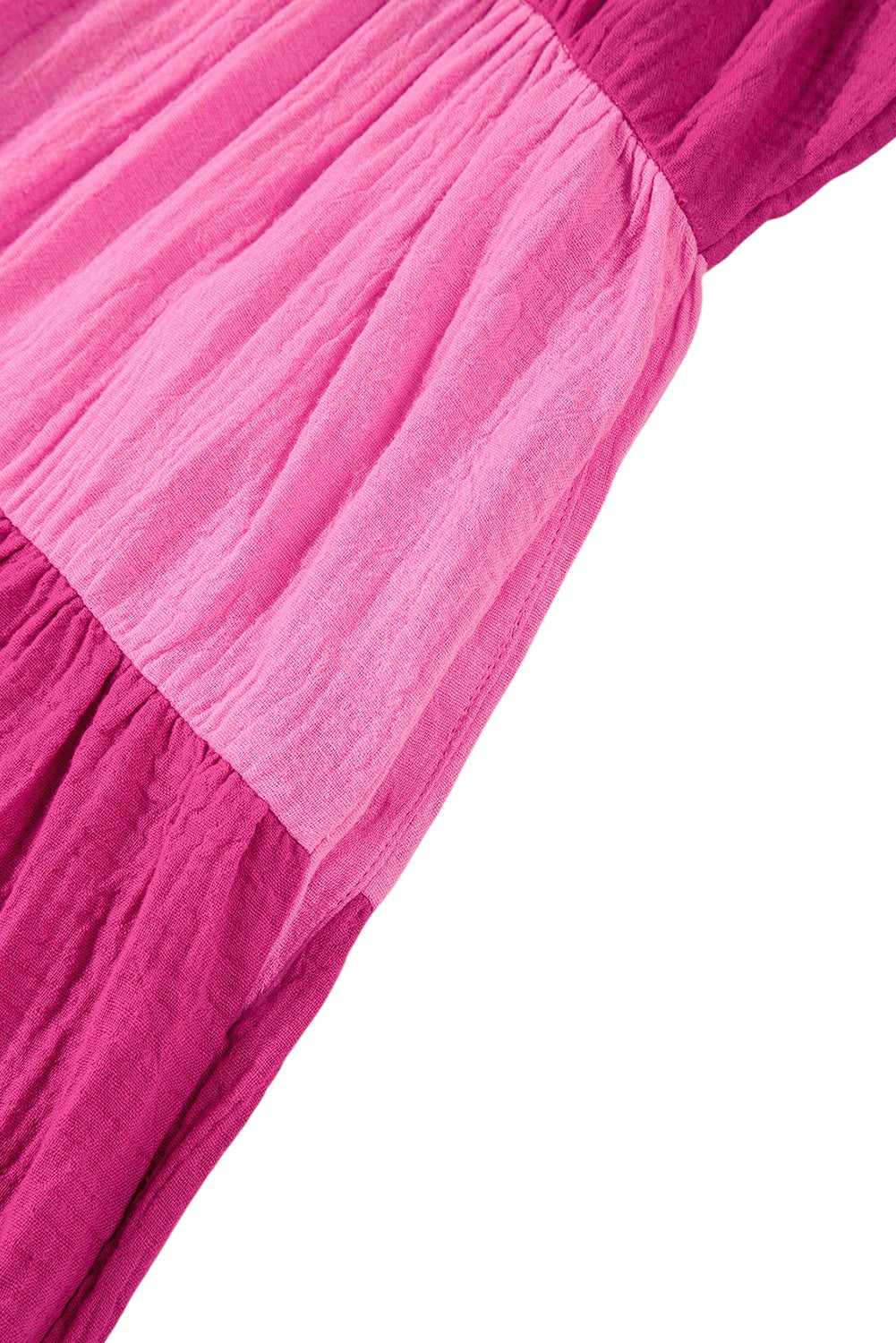 Close-up of a pink fabric with a white background. Women's dresses, mini dress, cotton dress, summer dress, 100% cotton dress, color block dress,