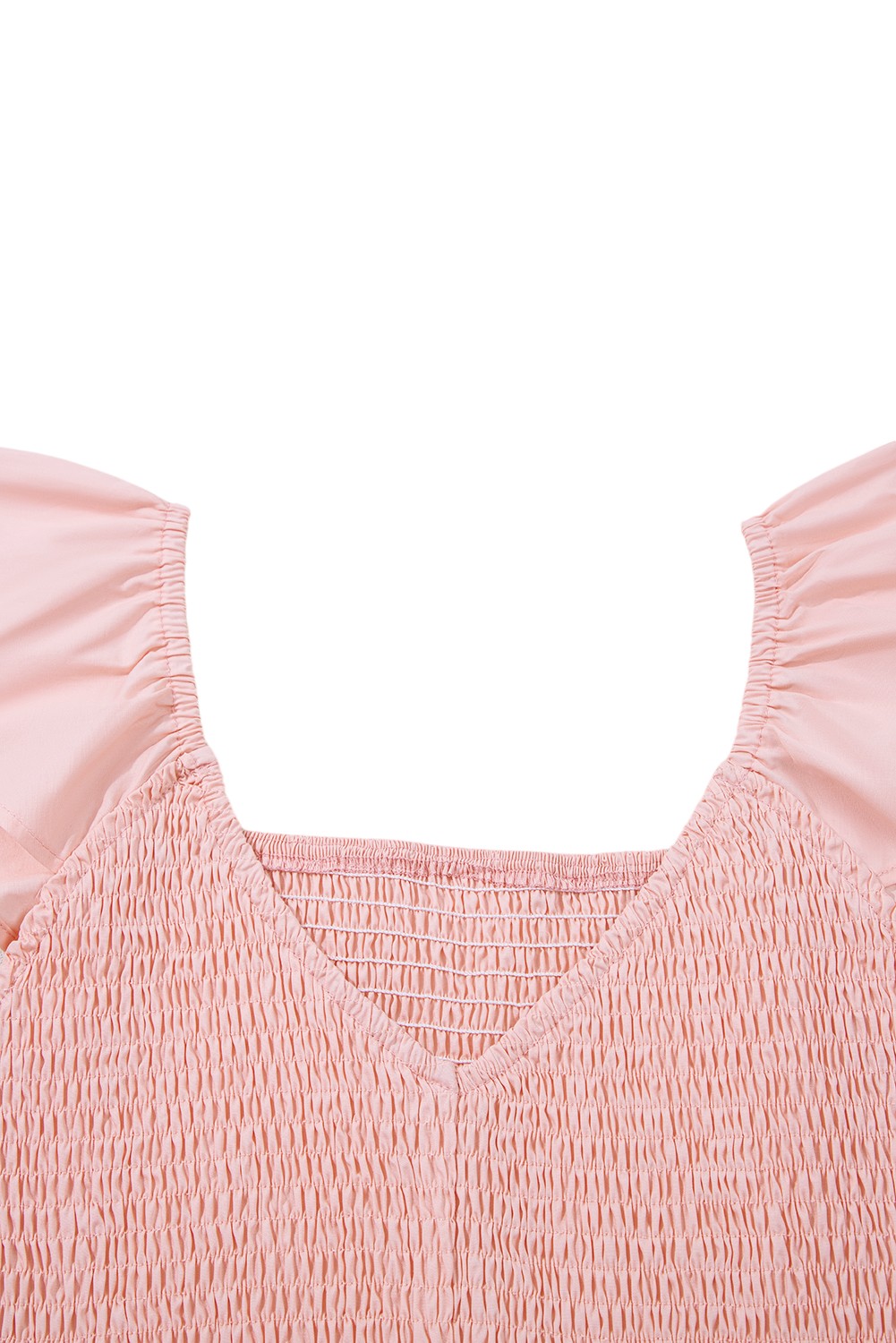 Close-up of a pink smocked dress with ruffled straps on a white background.Women's dress, maxi dress, cotton dress, summer dress, pink dress, pink maxi dress, 100% cotton dress