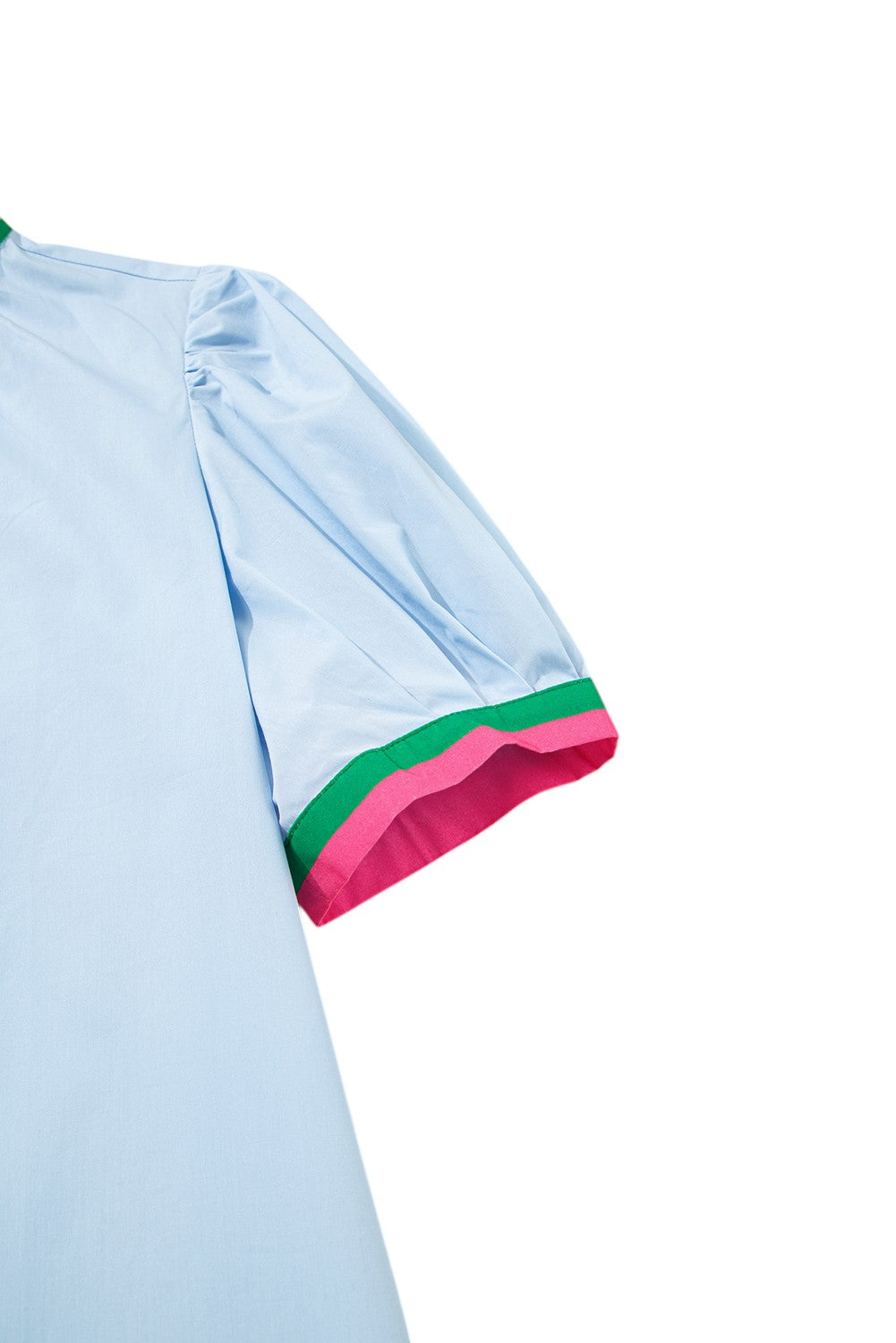 Light blue shirt with colorful trim on a white background. Women's dresses, cotton dresses, mini dress