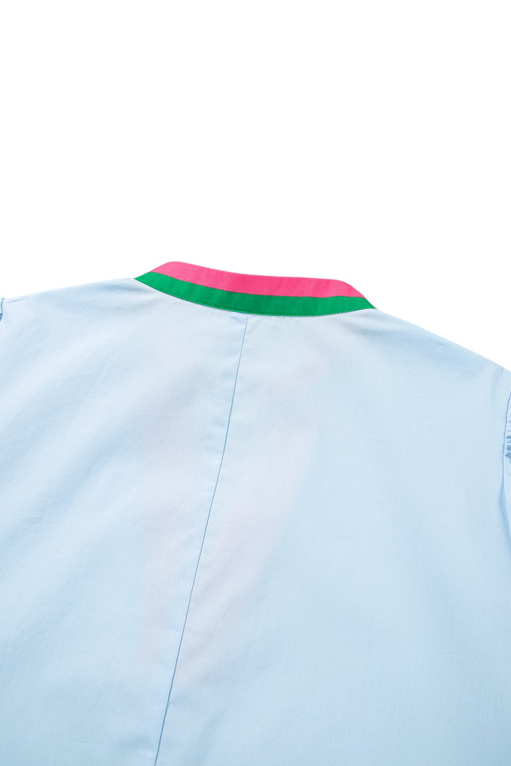 Light blue shirt with a colorful collar on a white background. Women's dresses, cotton dresses, mini dress