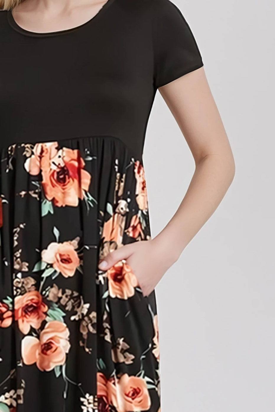Black dress with floral pattern on a plain background. Women's dresses, women's dress, fall dress, floral dress