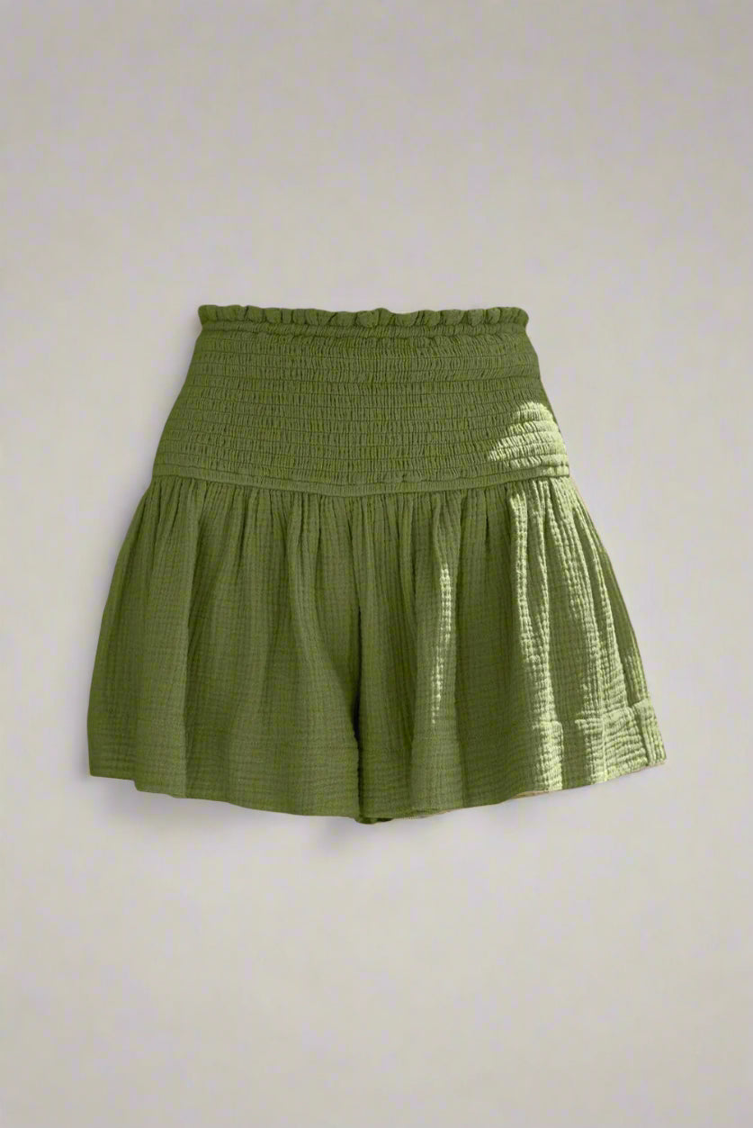 100% Cotton Green Moss Smocked Shorts on a plain background